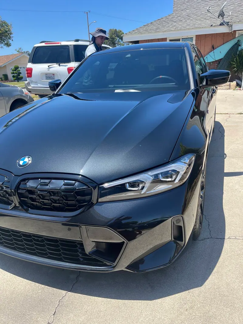 Glossy black BMW shared in Alex Q.’s Google review